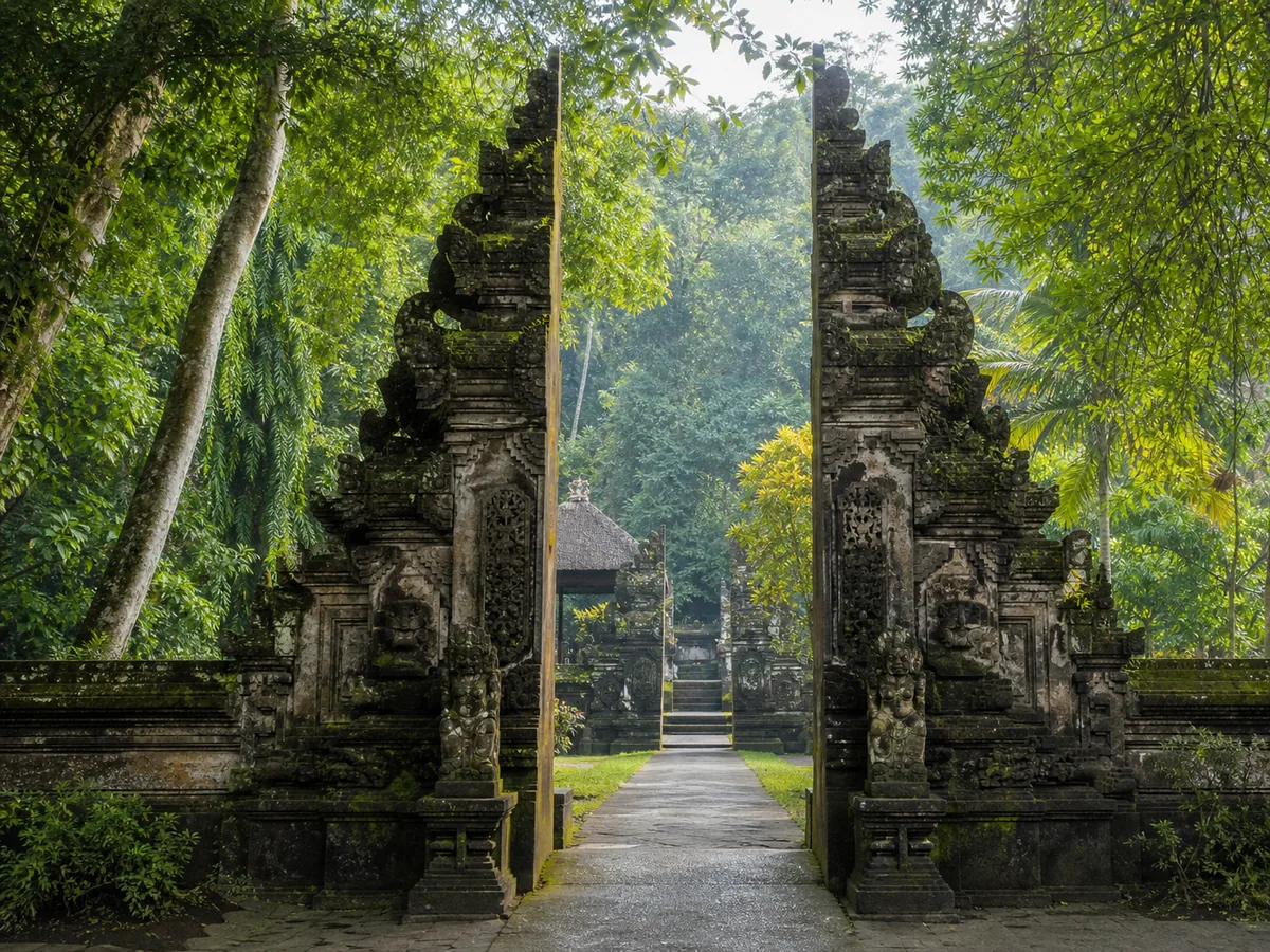 Traditional Balinese temple in Ubud surrounded by lush greenery